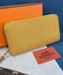 Hermes Evelyne Wallet Togo Leather Palladium Hardware In Yellow
