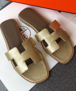 Hermes Oran Slides Women Grain Calfskin In Gold