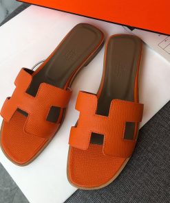 Hermes Oran Slides Women Grain Calfskin In Orange
